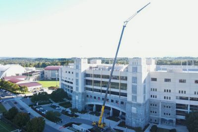 large crane hovers over Lane stadium