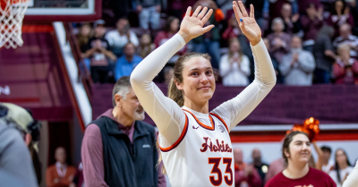 Liz Kitley waves to the crowd